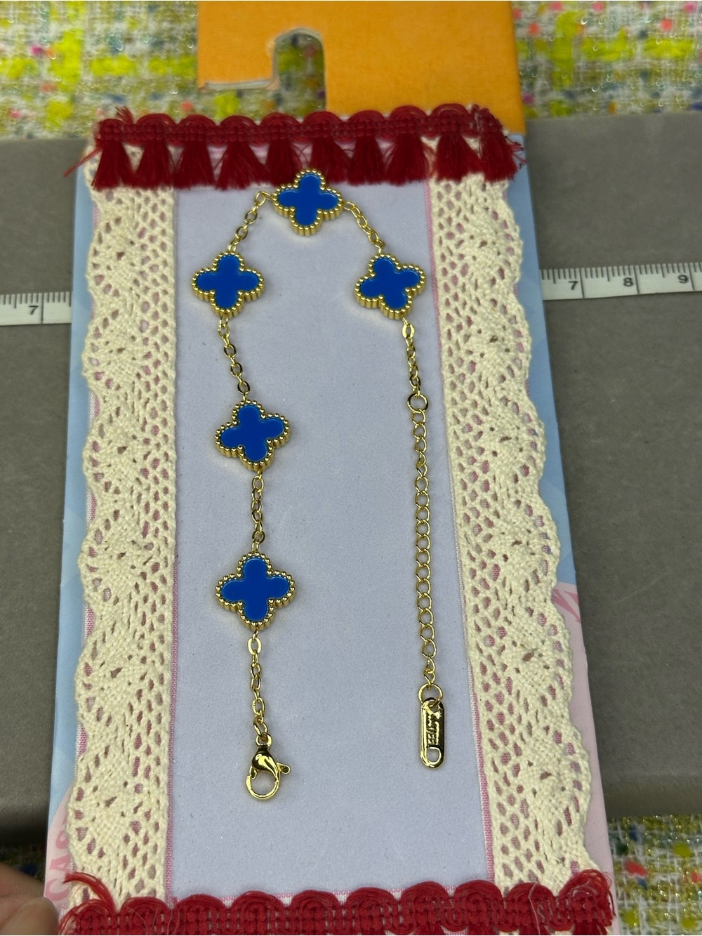 Gold-Tone Bracelet with Blue Clover Accents